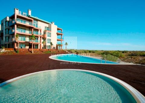 Apartamento T1+ 1 duplex em Troia com vista mar