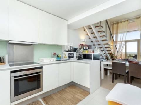 Apartamento T1+ 1 duplex em Troia com vista mar