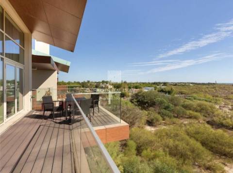 Apartamento T1+ 1 duplex em Troia com vista mar