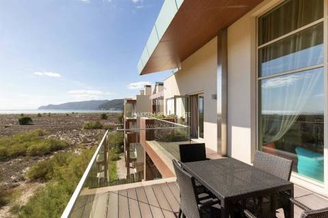 Apartamento T1+ 1 duplex em Troia com vista mar