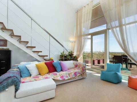 Apartamento T1+ 1 duplex em Troia com vista mar